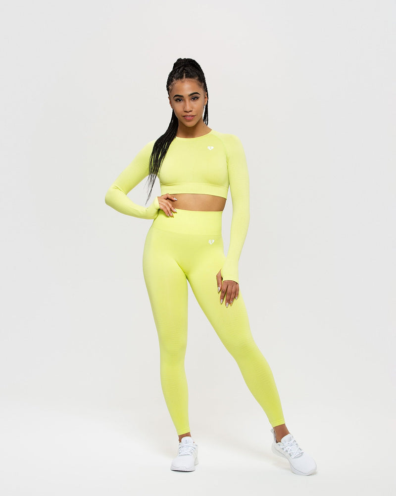 Neon yellow long store sleeve crop top